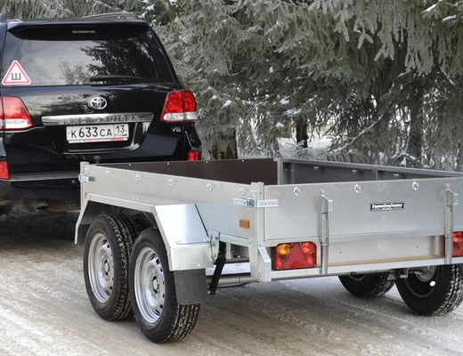 Прицеп бортовой двухосный с тормозом ССТ-7132-18 (платформа Ш=1510 мм)