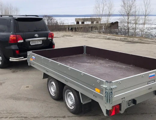 Прицеп бортовой двухосный без тормоза ССТ-7132-24 (платформа Ш=1821 мм)