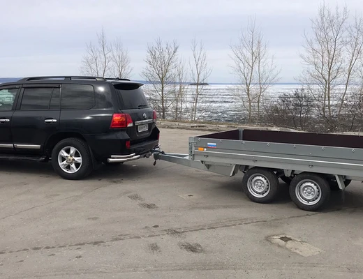 Прицеп бортовой двухосный с тормозом ССТ-7132-25 (платформа Ш=1821 мм)