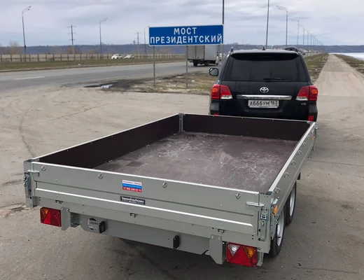 Прицеп бортовой двухосный с тормозом ССТ-7132-25 (платформа Ш=1821 мм)