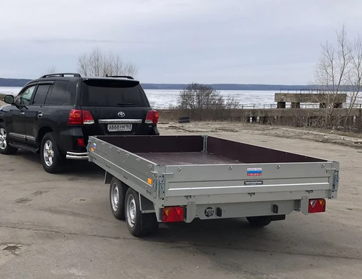 Прицеп бортовой двухосный с тормозом ССТ-7132-28 (платформа Ш=1821 мм)